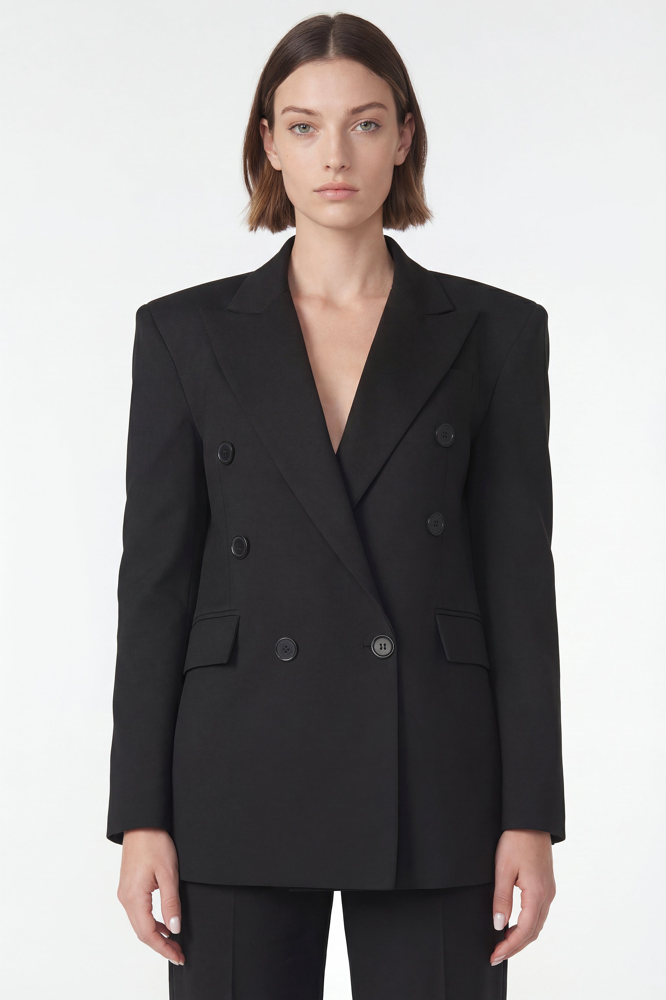 Front view of corja's The Blazer, a stylish tailored blazer in a classic design, shown on a mannequin.